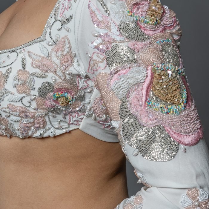 Close-up of hand embroidery and beadwork
